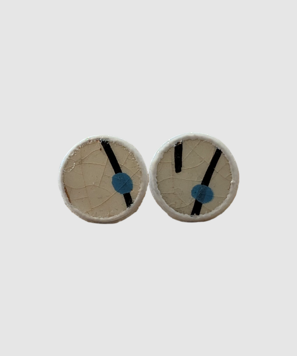 Handmade earrings made of Palestinian ceramics - Å