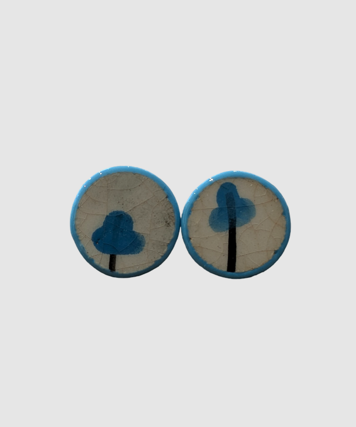 Handmade earrings made of Palestinian ceramics - Å